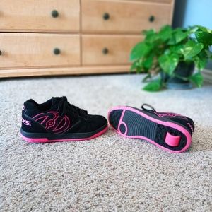 Heelys women's size 7 hot pink and black shoes.